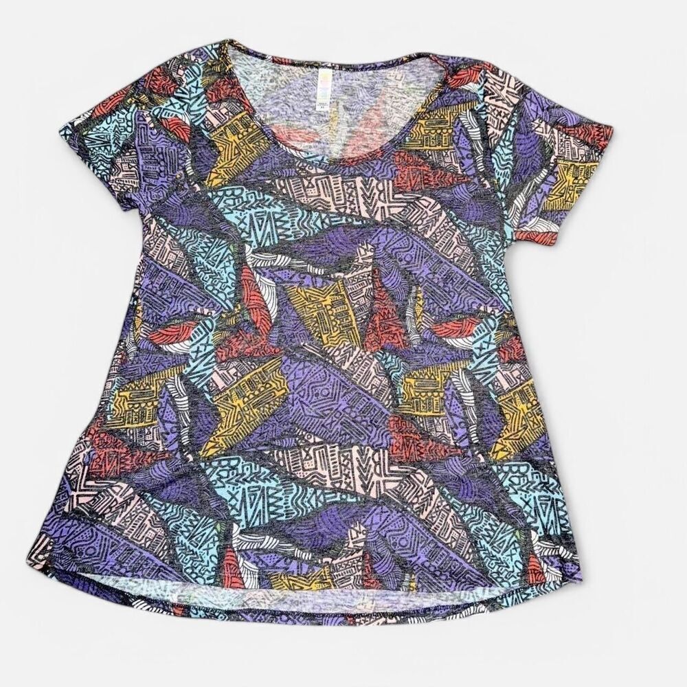 Lularoe “Classic Tee” Purple and pastel Geometric Short Sleeve Shirt